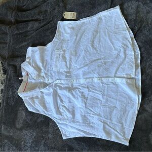 Woman’s white sleeveless clip dot shirt